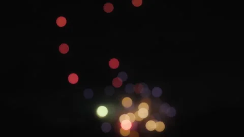 Abstract bokeh lights of fireworks exploding in the sky Video stock 319823171