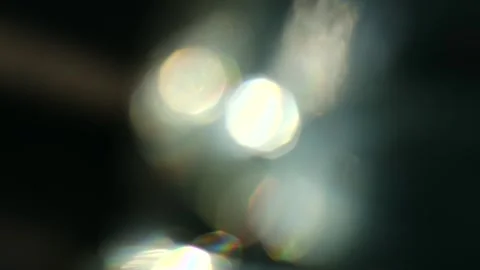 Abstract bokeh lights shimmering on dark background Video stock 337547178