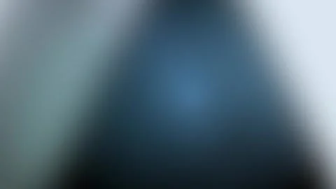 Abstract bokeh lights with smooth cinematic camera drift in cool blue and g.. Stock Footage 340943573