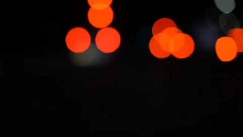 Abstract bokeh lights through windshield, driving POV Video stock 114124560