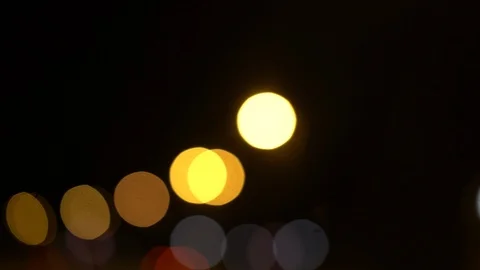 Abstract bokeh lights through windshield, driving POV Video stock 114124634