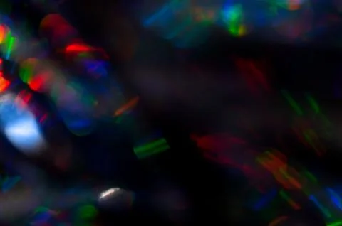 Abstract Bokeh lines on dark backdrop. Stock Photos