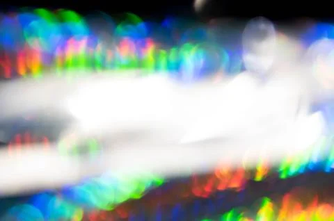 Abstract Bokeh lines on dark backdrop. Stock Photos