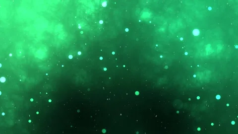 Abstract bokeh particles float slowly in the air on a green background. Stock-Footage 293472414