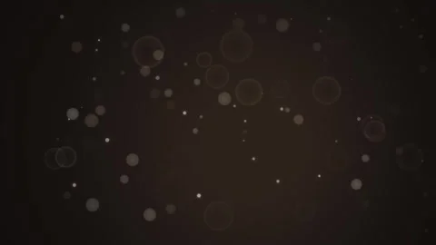 Abstract bokeh particles floating on dark brown background creates elegant .. Stock-Footage 345743301