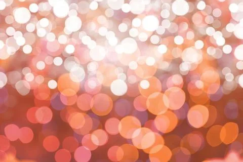 Abstract bokeh pattern is glowing across flat vector design, showing warm light Stock Photos