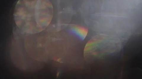 Abstract bokeh reflection of seven brilliant colors light leaks Видео 318823578