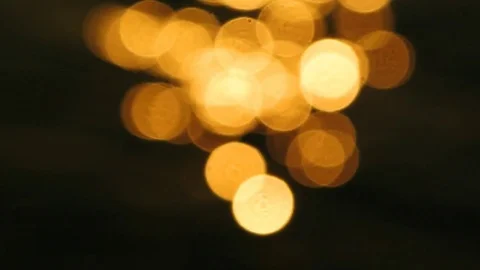 Abstract bokeh of sunset light on sea water surface Vidéo 72255644