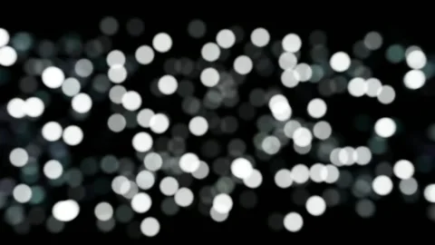 Abstract bokeh white lights blinking in space Stock Footage 260771033