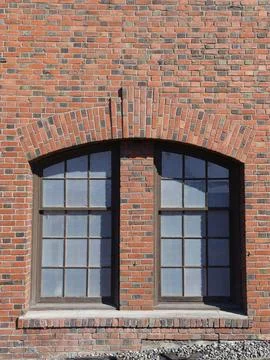 Abstract of brick wall and a window. Stock Photos
