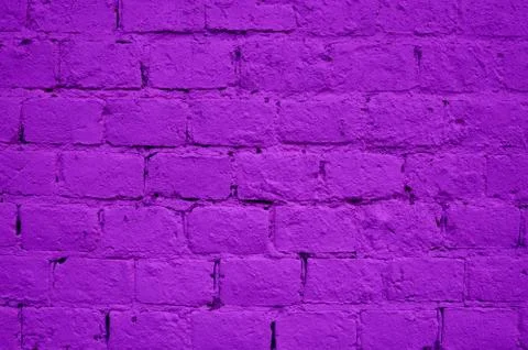 Abstract brick wall texture background, purple color. Stone blocks. Stock Photos