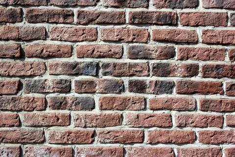 Abstract brick wall texture with dirty spots for the background for the design Stock Photos
