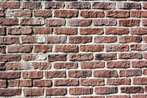 Abstract brick wall texture with dirty spots for the background for the design Stock Photos