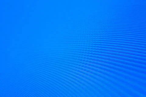 An abstract bright blue background with clear waves, interference, moire Stock Illustration