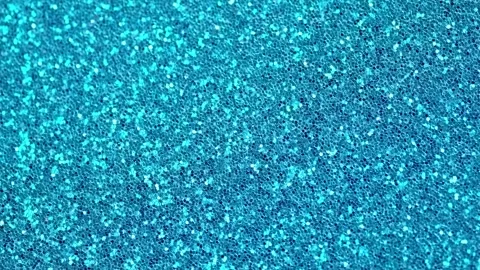 Abstract bright blue background, motion glittering blue lights, bokeh effect. Video stock 249511419