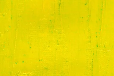 Abstract bright colored background: yellow paint on blue fabric close Foto stock