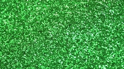 Abstract bright green background, motion blurred glittering green lights Stock Footage 248454973