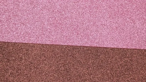 Abstract bright pink brown background slowly rotating close-up. top view. 4k. Stock Footage 204120081