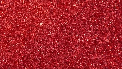 Abstract bright red background, motion blurred glittering red lights, bokeh.. Video stock 248911591