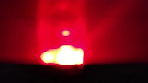 Abstract bright red light glow effect on dark background a radiant 스톡 동영상 336204772