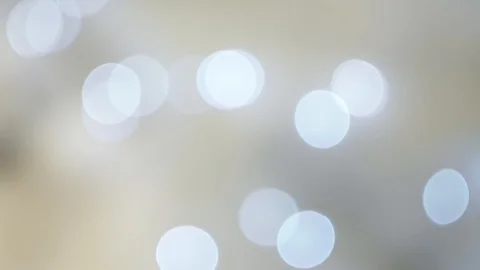 Abstract bright silver bokeh lights on defocused grey multicolor background Vídeos de archivo 100091396