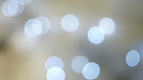 Abstract bright silver bokeh lights on defocused grey multicolor background Vídeos de archivo 100091398