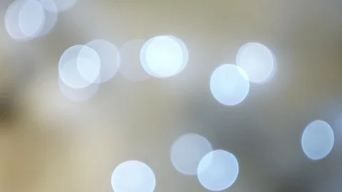 Abstract bright silver bokeh lights on defocused grey multicolor background Vídeos de archivo 100091409
