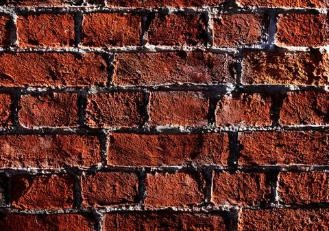Abstract brown brick wall texture background. Brickwork close-up. Stock Photos