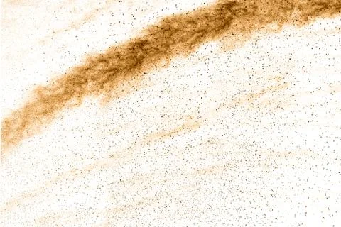 Abstract brown dust explosion on  white background. Stock Photos