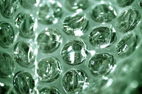 Abstract Bubble Wrap Plastic Circles Shiny Coloured Background Stock Photos