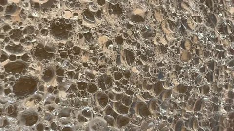 Abstract bubbles popping and bubbling mixture of oil and water background Stock Footage 240733564