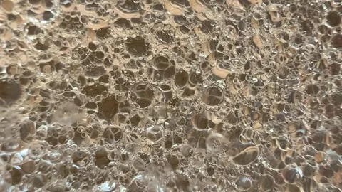Abstract bubbles popping and bubbling mixture of oil and water background Stock Footage 240733692