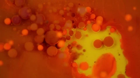 Abstract Bubbles in Vibrant Yellow, Red, Purple, and Orange Texture Stock Footage 282272607