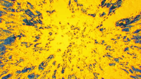 Abstract bubbles yellow paint seethes and moves. Stock Footage 133956550