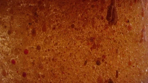 Abstract bubbling orange planet surface texture background Video stock 118296246