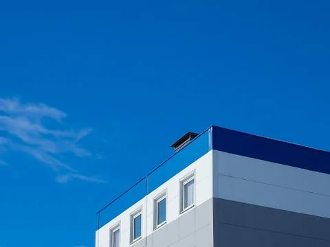 Abstract Building Background against sky and clouds Stock Photos