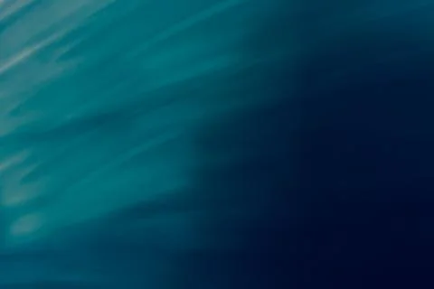 Abstract business background in blue tones with gradient and waves. Stock Photos