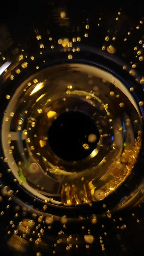 Abstract camera eye background from a glass of champagne Stock Footage 292153021