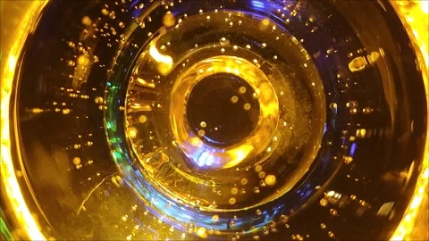 Abstract camera eye background from a glass of champagne 動画素材 294760722