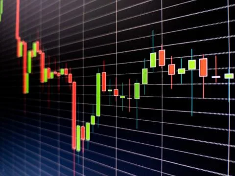 Abstract candlestick chart on dark blue digital screen. Stock market data chart 写真素材