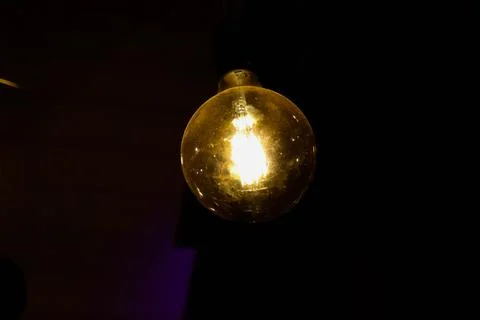 Abstract capture of light bulb on a dark background Stock Photos