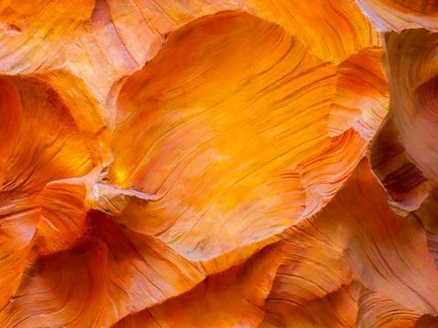Abstract cave wall texture, orange color background. Scene of wonderful low.. Stock Photos