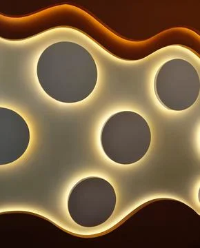 Abstract ceiling with circular openings and illuminated edges Stock Photos