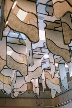 Abstract ceiling decor with fabric panels in contemporary interior style Stock Photos
