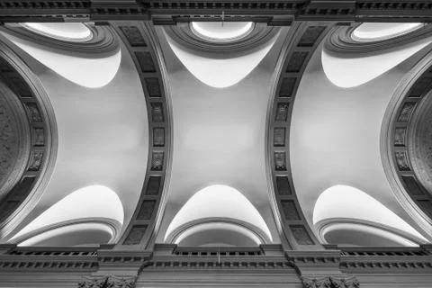 Abstract ceiling detail with curved sections and shapes, low angle view. Stock Photos