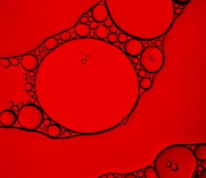 Abstract of cells on a red background Stock Photos