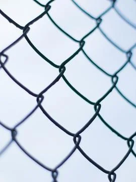 Abstract Chain Link Fence Pattern with Selective Focus - Minimalist Wire Me.. Stock Photos