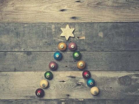 Abstract Christmas tree shape on rustic wood Stock Photos