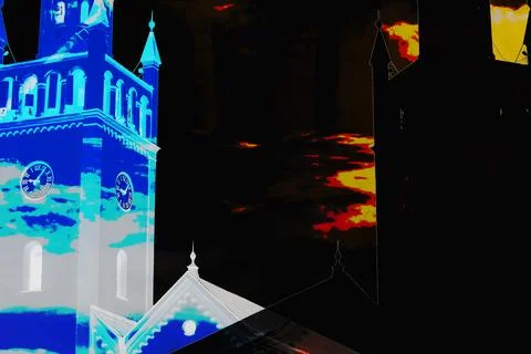 Abstract church tower under dramatic night sky Stock Photos