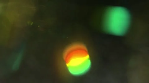 Abstract cinematic light leaks overlay glowing colorful bokeh particles Stock-Footage 343843242